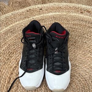 Air Jordan’s Men's Black and White Athletic Shoes